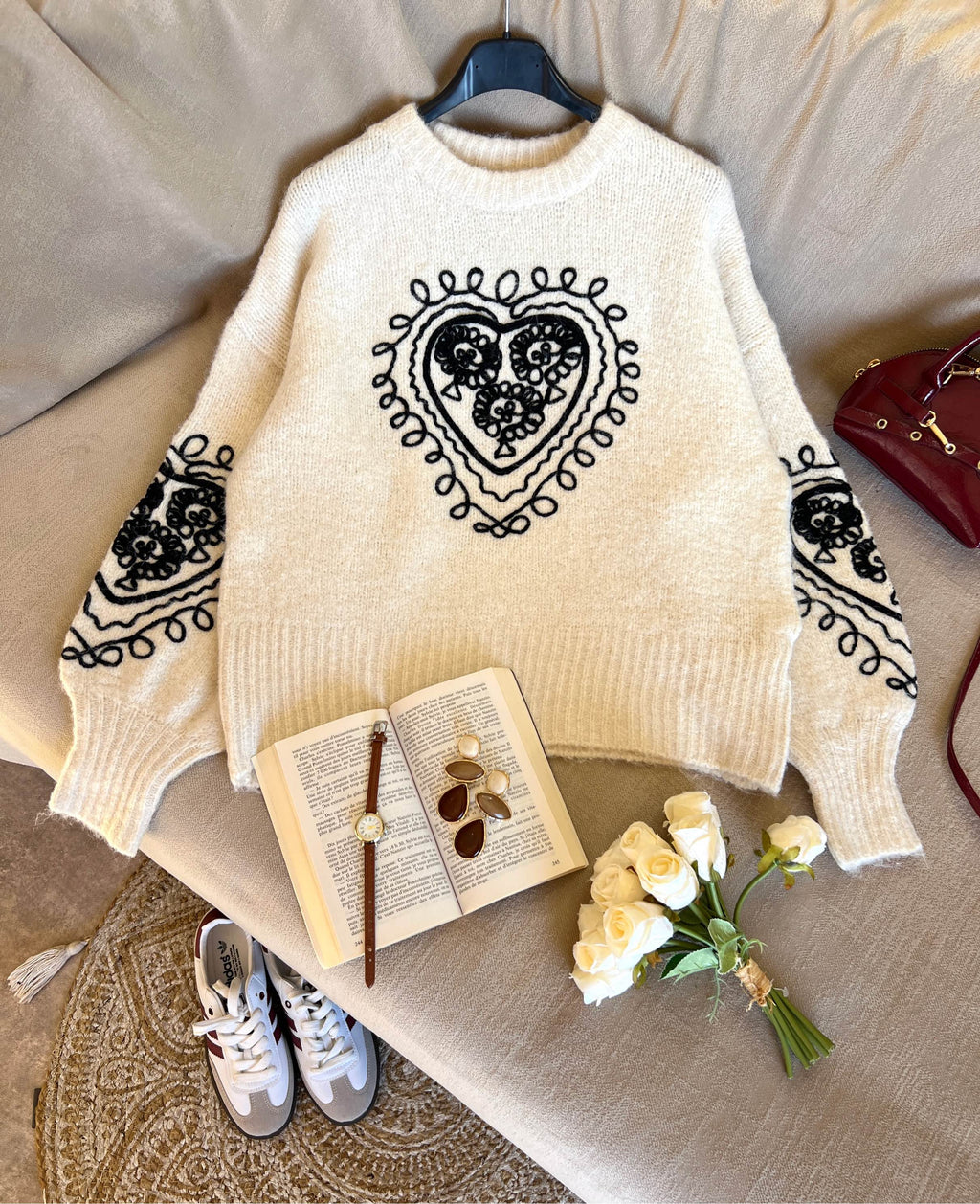 Pull brodé cœur