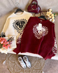 Pull brodé cœur